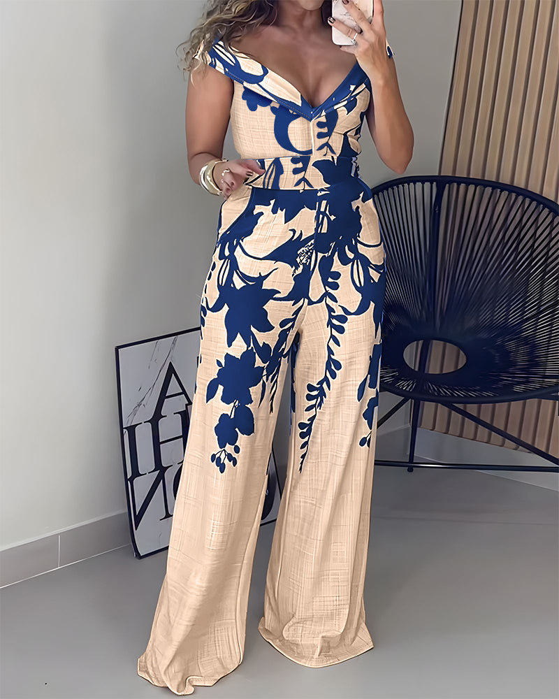 Elegant Floral Wide-Leg Jumpsuit with Pockets and Adjustable Straps - Jamota