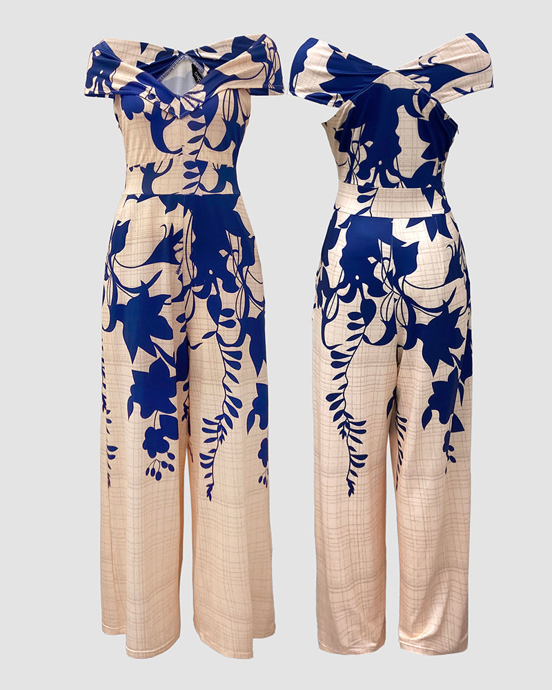 Elegant Floral Wide-Leg Jumpsuit with Pockets and Adjustable Straps - Jamota