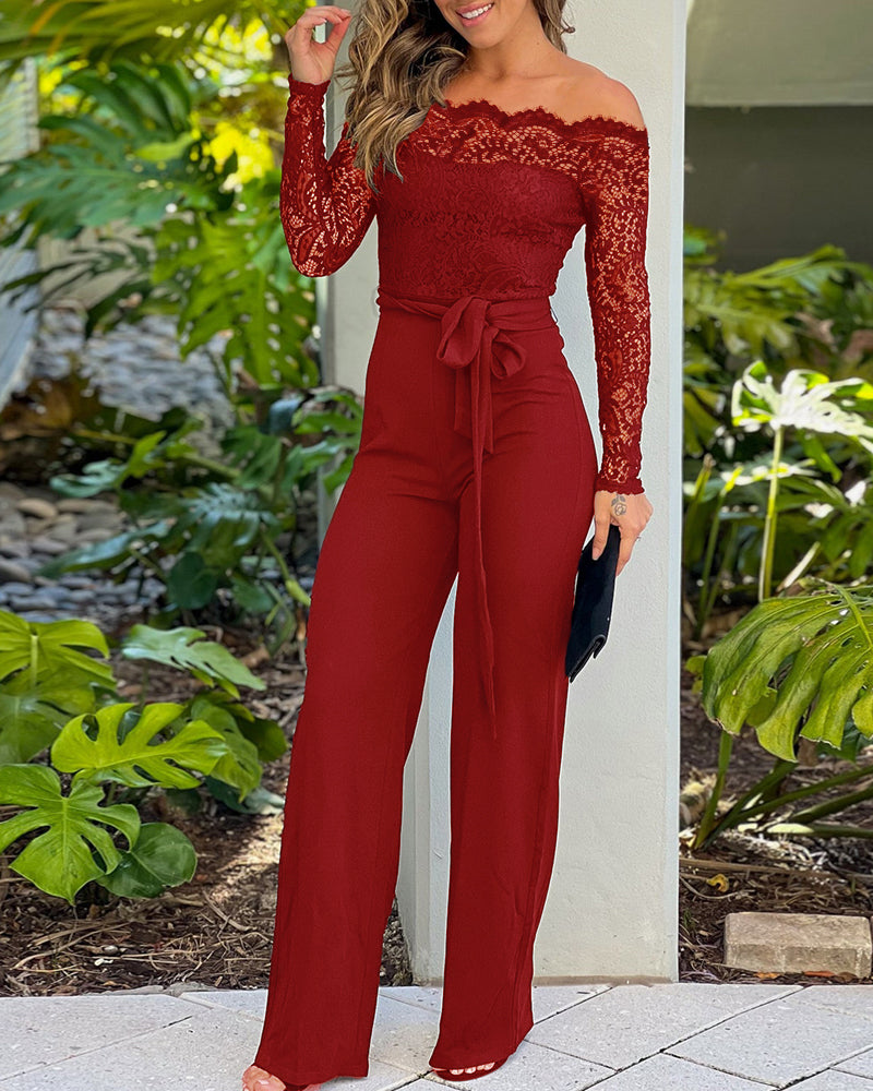 Elegant Black Slim Fit Jumpsuit with Belted Waist and Pockets