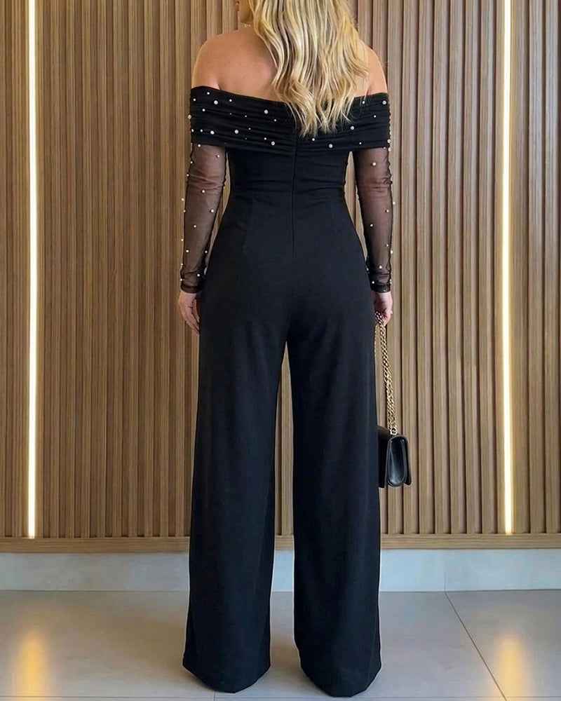 Elegant Sheer Off-Shoulder Jumpsuit with Flattering Fit & Flowing Desi