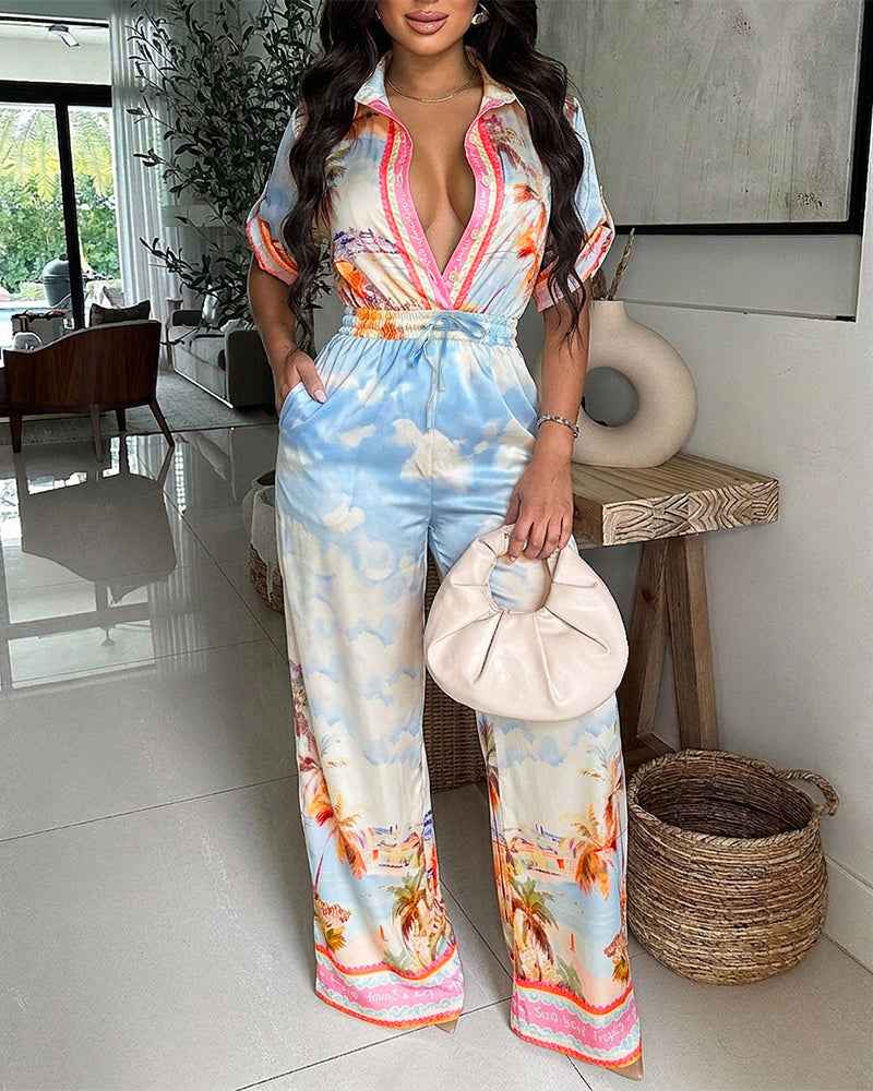 Elegant Tropical Print Jumpsuit with Flattering Fit and Pockets