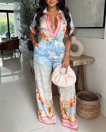 Elegant Tropical Print Jumpsuit with Flattering Fit and Pockets