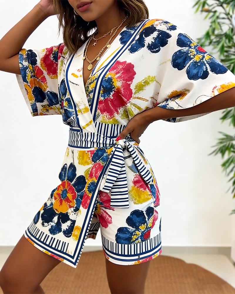 Elegant Floral Print Summer Romper with Adjustable Straps & Pockets