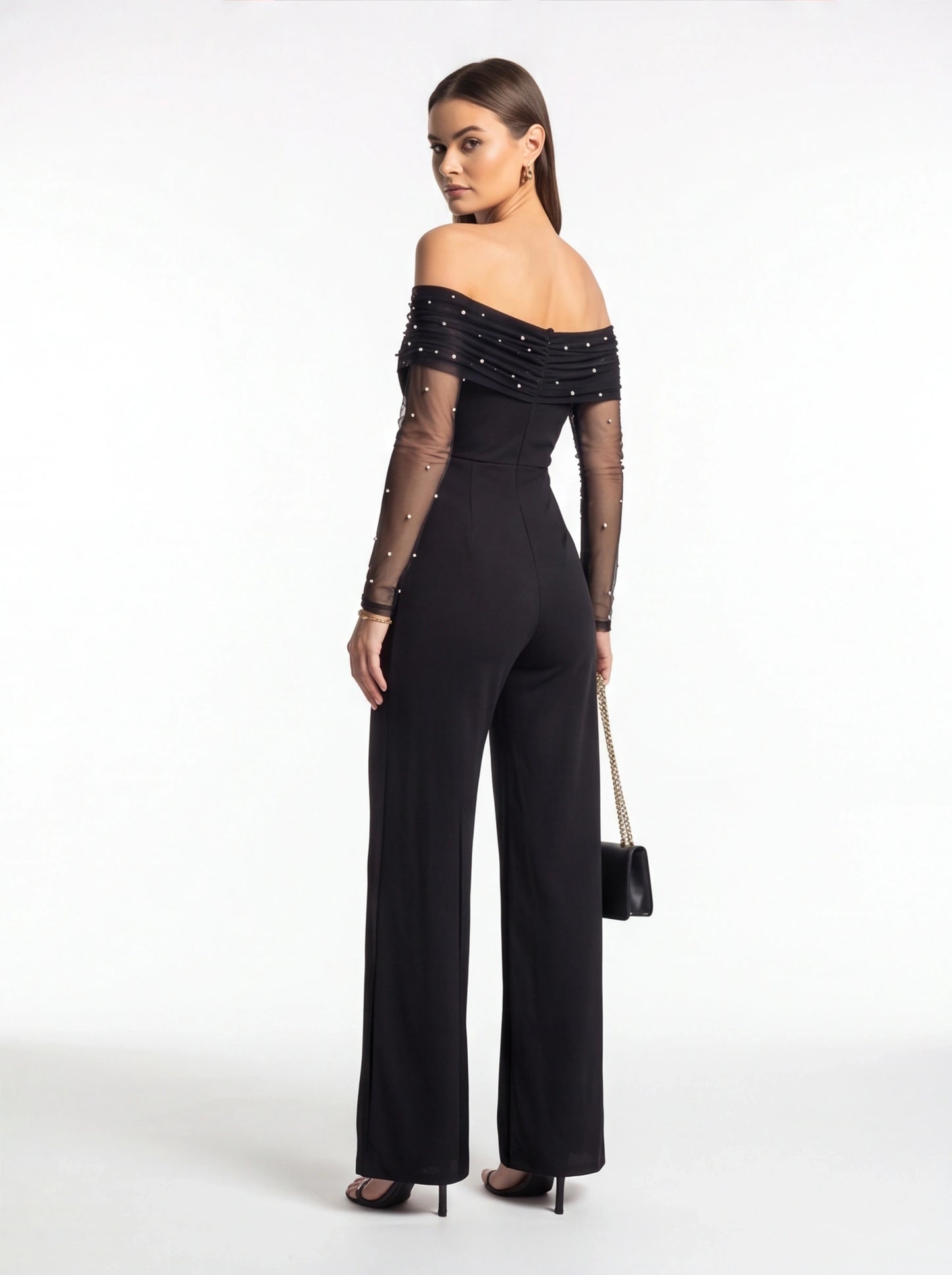 Jamota black jumpsuit with off-shoulder neckline, sheer pearl-embellished sleeves and wide-leg pants