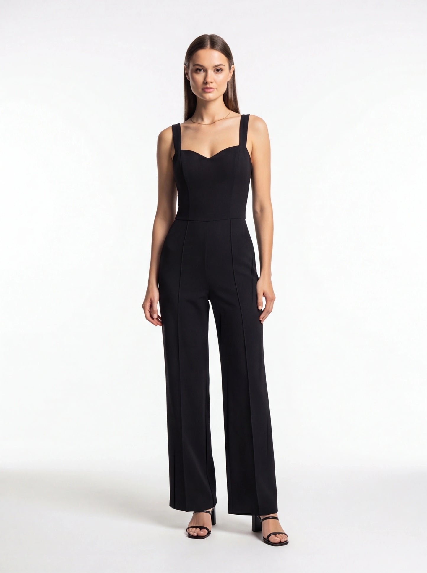 Jamota black women's jumpsuit featuring a sweetheart neckline, thick shoulder straps and tailored wide-leg trousers.