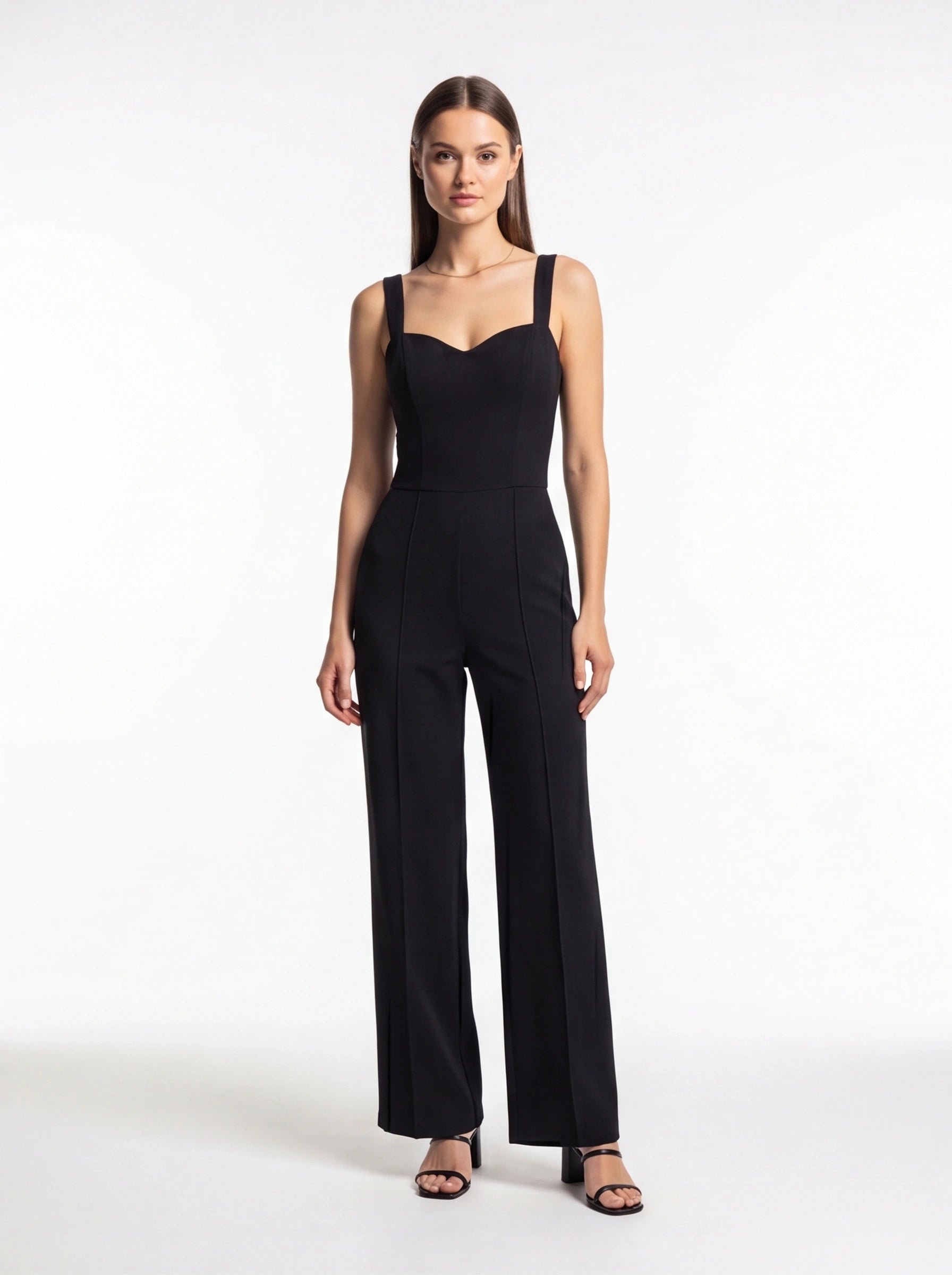 Jamota black women's jumpsuit featuring a sweetheart neckline, thick shoulder straps and tailored wide-leg trousers.