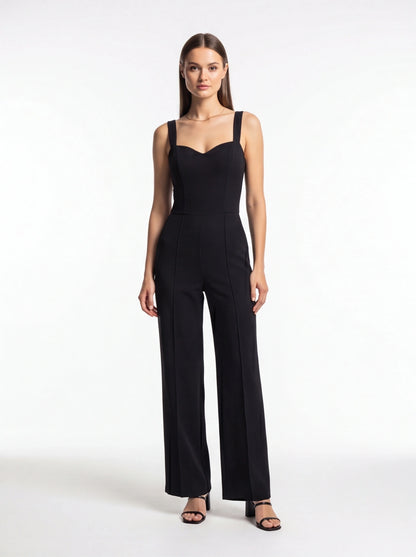 Jamota black women's jumpsuit featuring a sweetheart neckline, thick shoulder straps and tailored wide-leg trousers.