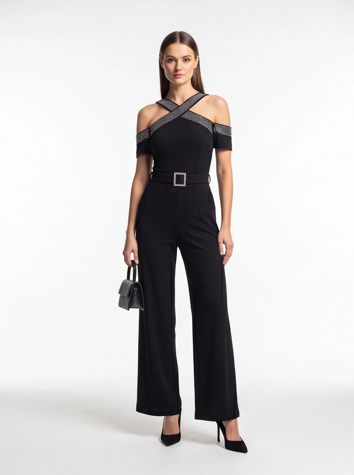 Jamota black women's jumpsuit with off-shoulder neckline, cross-straps, belted waist with square buckle, wide legs.