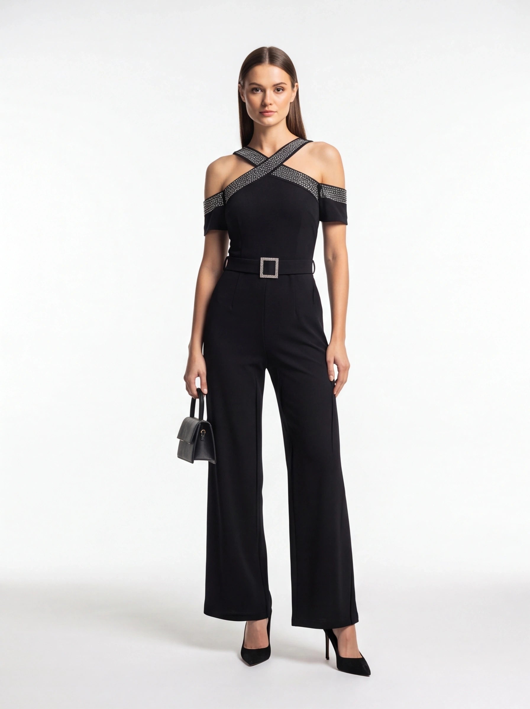 Jamota black women's jumpsuit with off-shoulder neckline, cross-straps, belted waist with square buckle, wide legs.