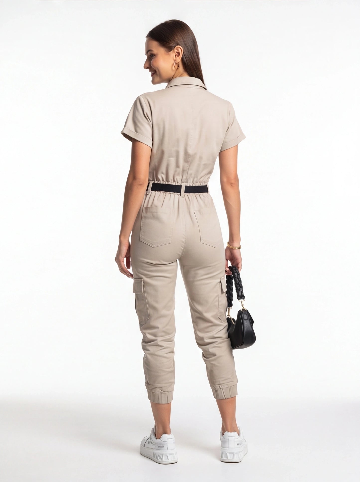 Jamota beige jumpsuit for women with pockets, cargo pockets and a waist belt.