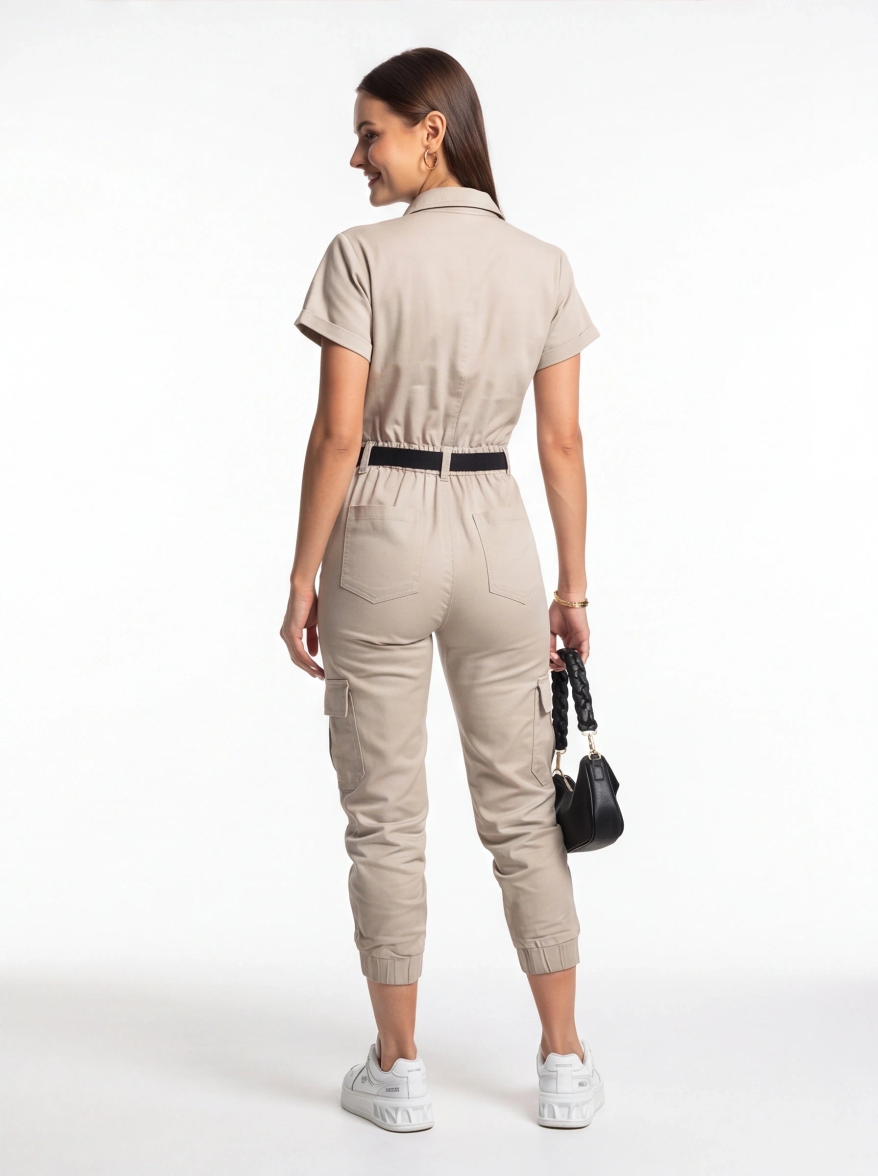 Jamota beige jumpsuit for women with pockets, cargo pockets and a waist belt.