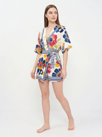 Jamota white floral print romper with adjustable straps, pockets and striped waist belt