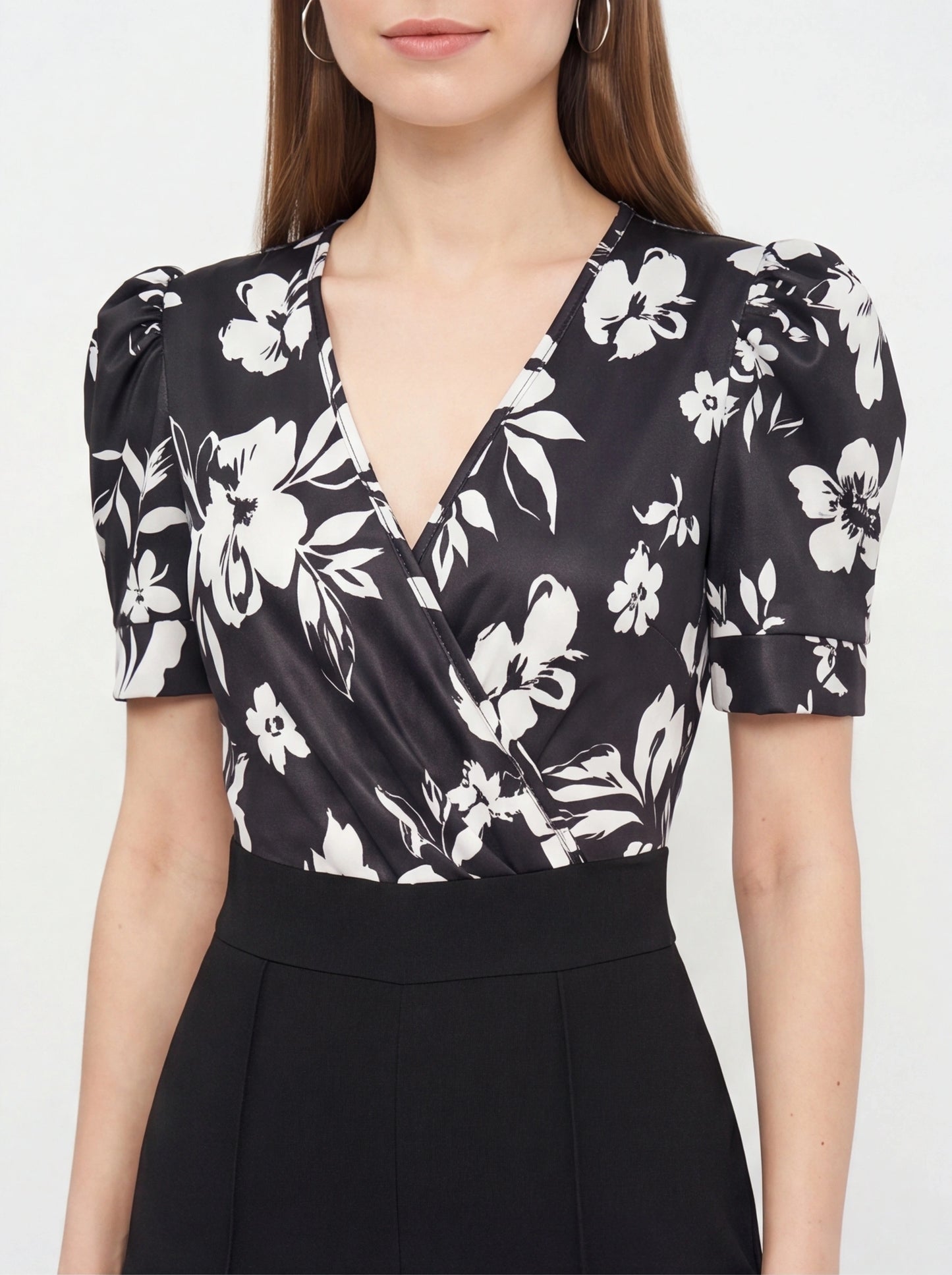 Jamota black floral print jumpsuit with wrap V-neck and short puff sleeves