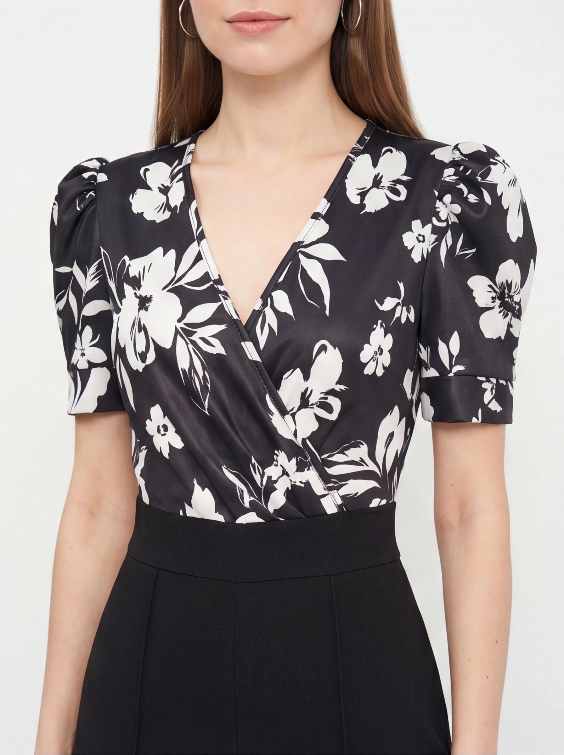 Jamota black floral print jumpsuit with wrap V-neck and short puff sleeves