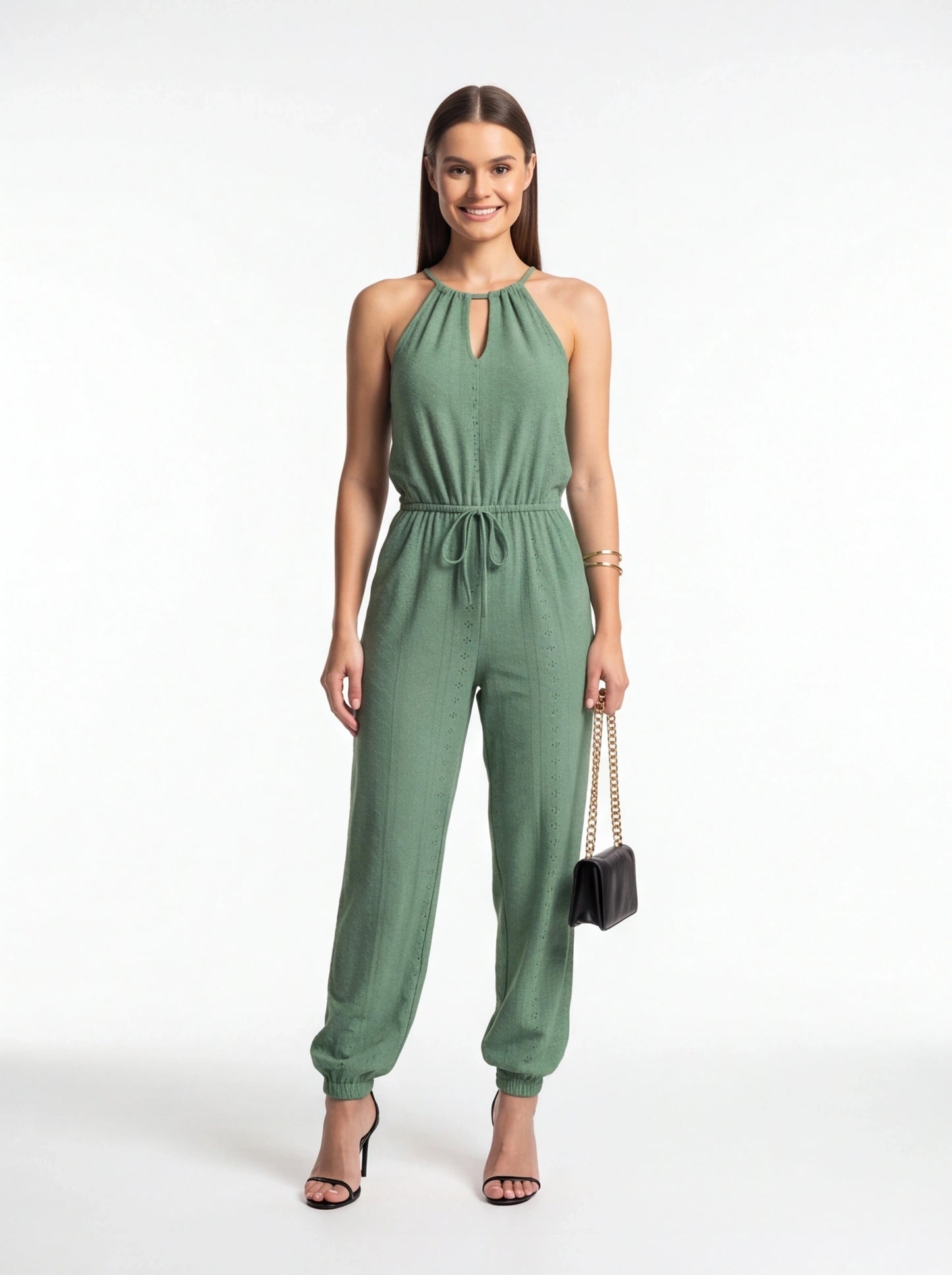 Jamota green halter-neck high-waist jumpsuit with a drawstring waist and wide-leg pants.