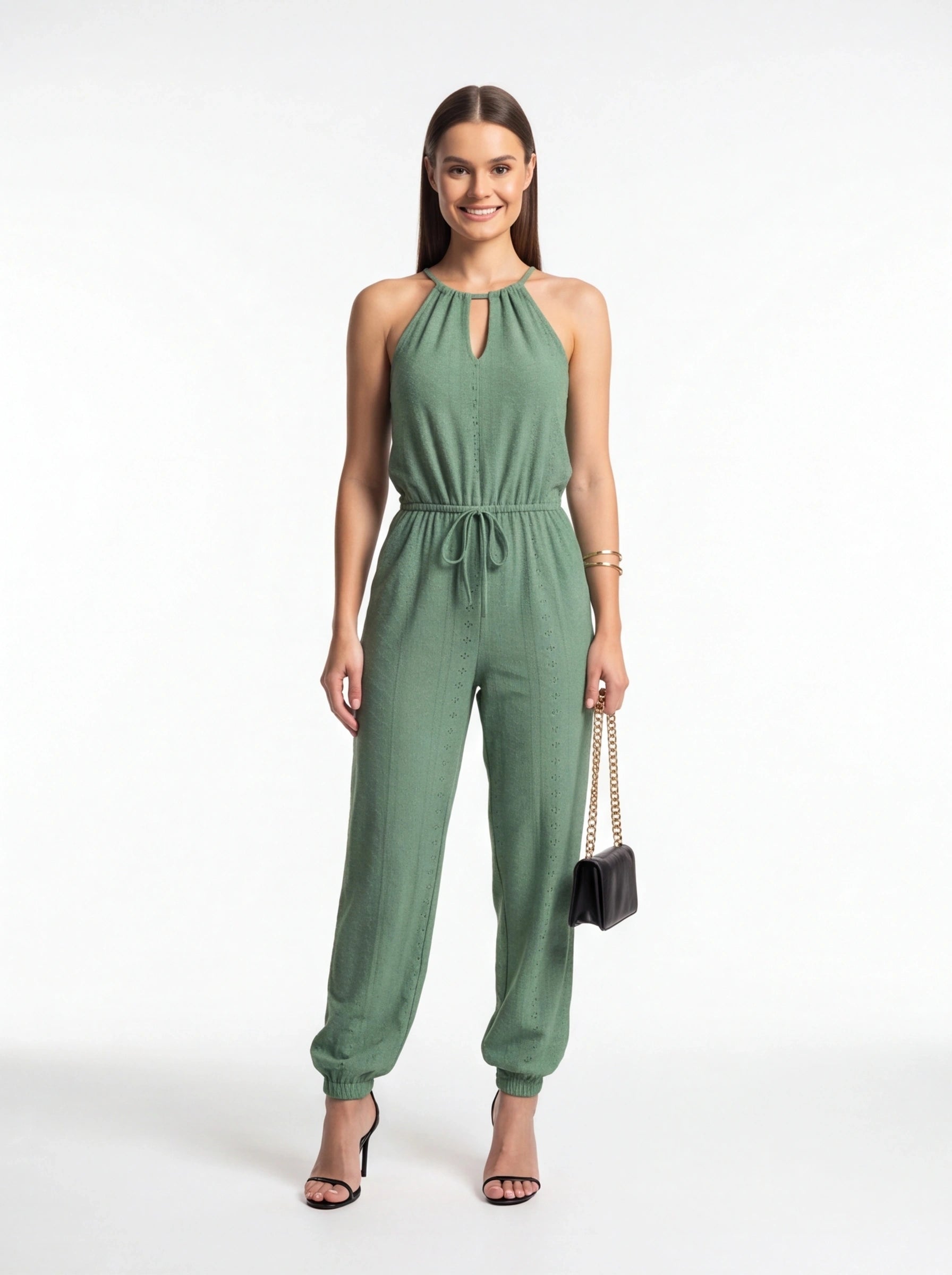 Jamota green halter-neck high-waist jumpsuit with a drawstring waist and wide-leg pants.