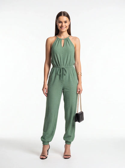 Jamota green halter-neck high-waist jumpsuit with a drawstring waist and wide-leg pants.