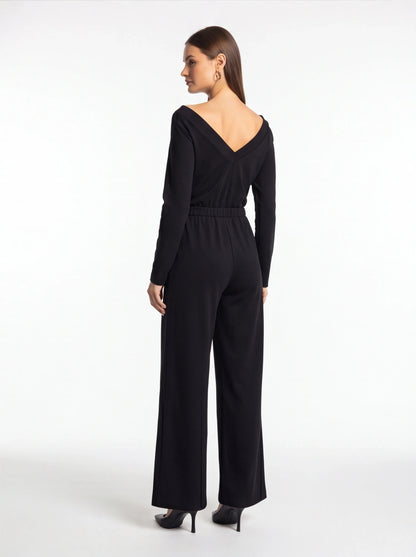 Jamota black jumpsuit with V-back neckline, long sleeves, elastic waist and wide-leg pants.