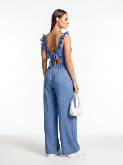 Jamota blue jumpsuit with ruffled shoulder straps, back bow, wide-leg silhouette, elastic waist, pockets