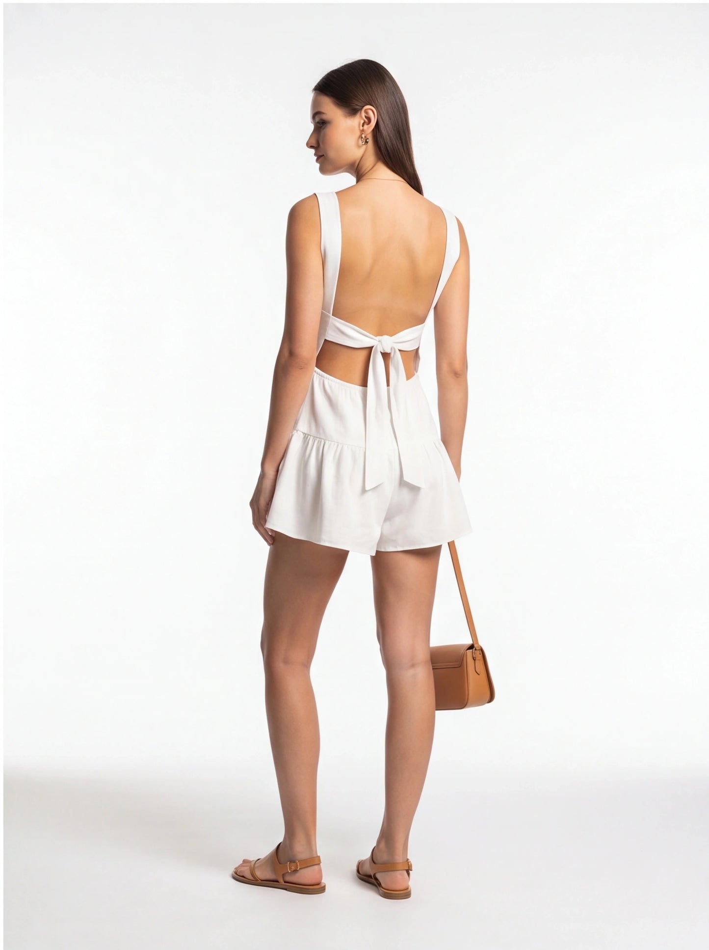 Jamota white backless jumpsuit with wide straps and a back bow, one-piece