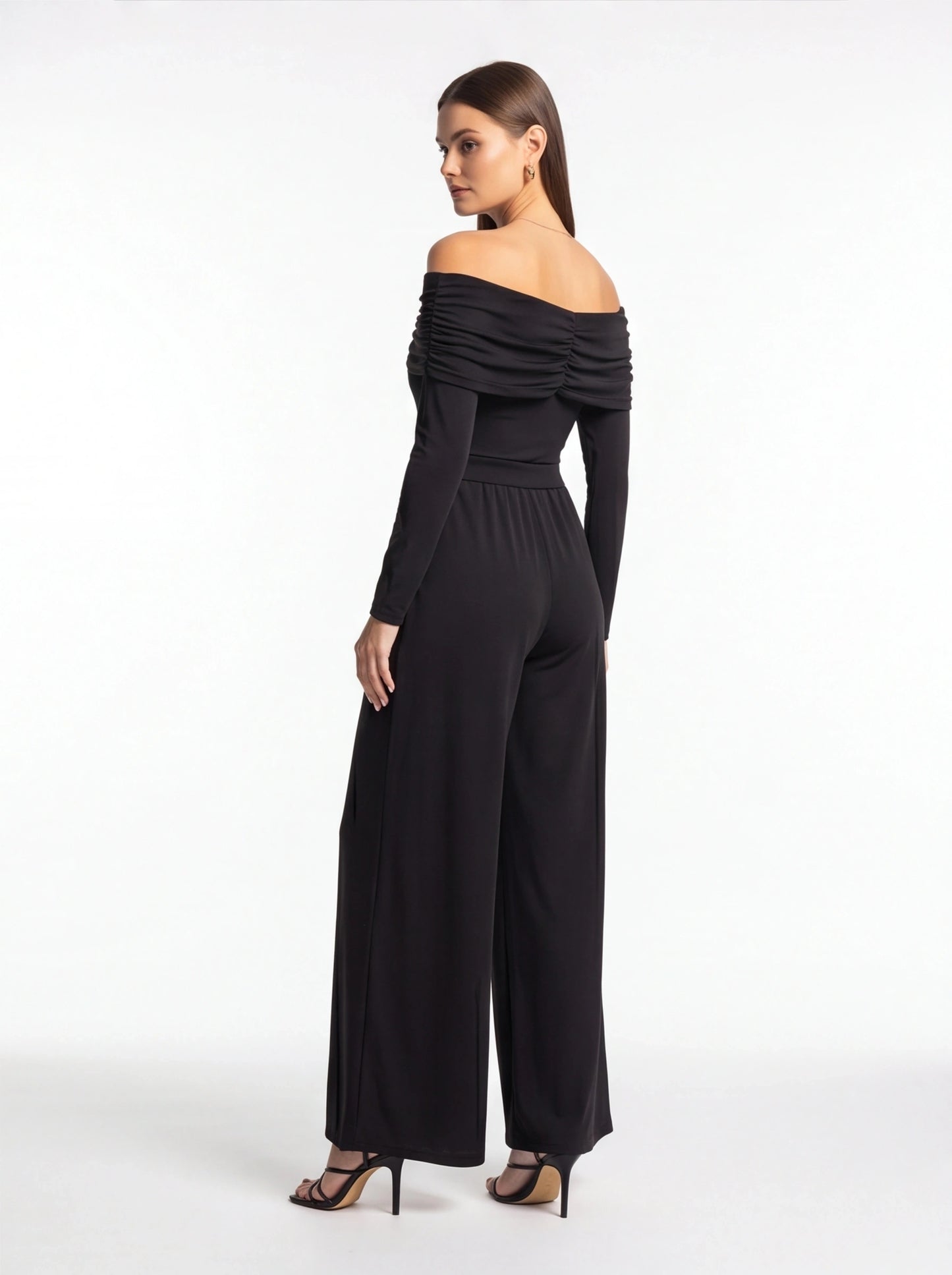 Jamota black off-shoulder jumpsuit with ruched bodice, belt at waist, long sleeves and wide-leg pants