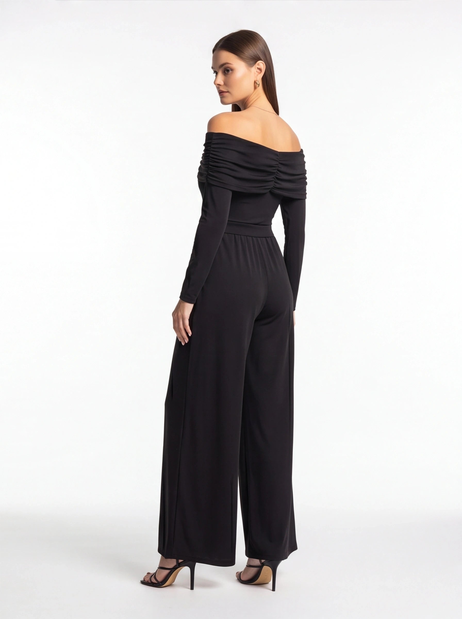 Jamota black off-shoulder jumpsuit with ruched bodice, belt at waist, long sleeves and wide-leg pants