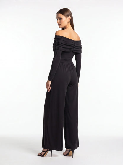 Jamota black off-shoulder jumpsuit with ruched bodice, belt at waist, long sleeves and wide-leg pants