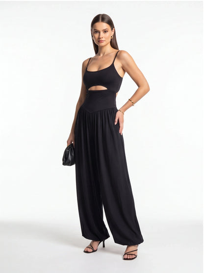 Jamota black backless jumpsuit with adjustable spaghetti straps and wide-leg pants.