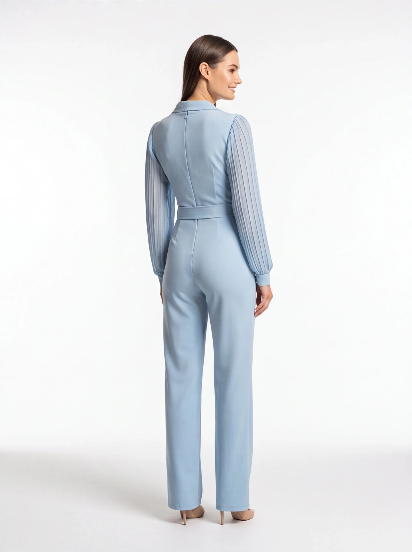 Jamota light-blue jumpsuit with tailored fit, pleated sheer long sleeves, waist belt and back zipper.