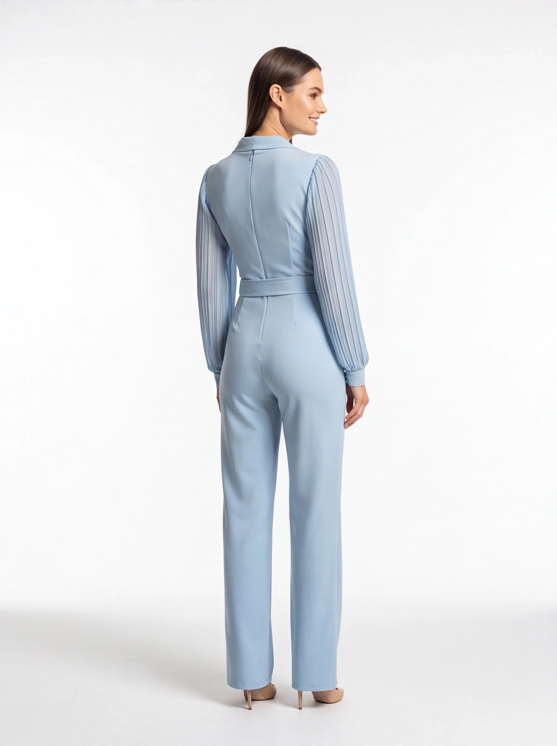 Jamota light-blue jumpsuit with tailored fit, pleated sheer long sleeves, waist belt and back zipper.