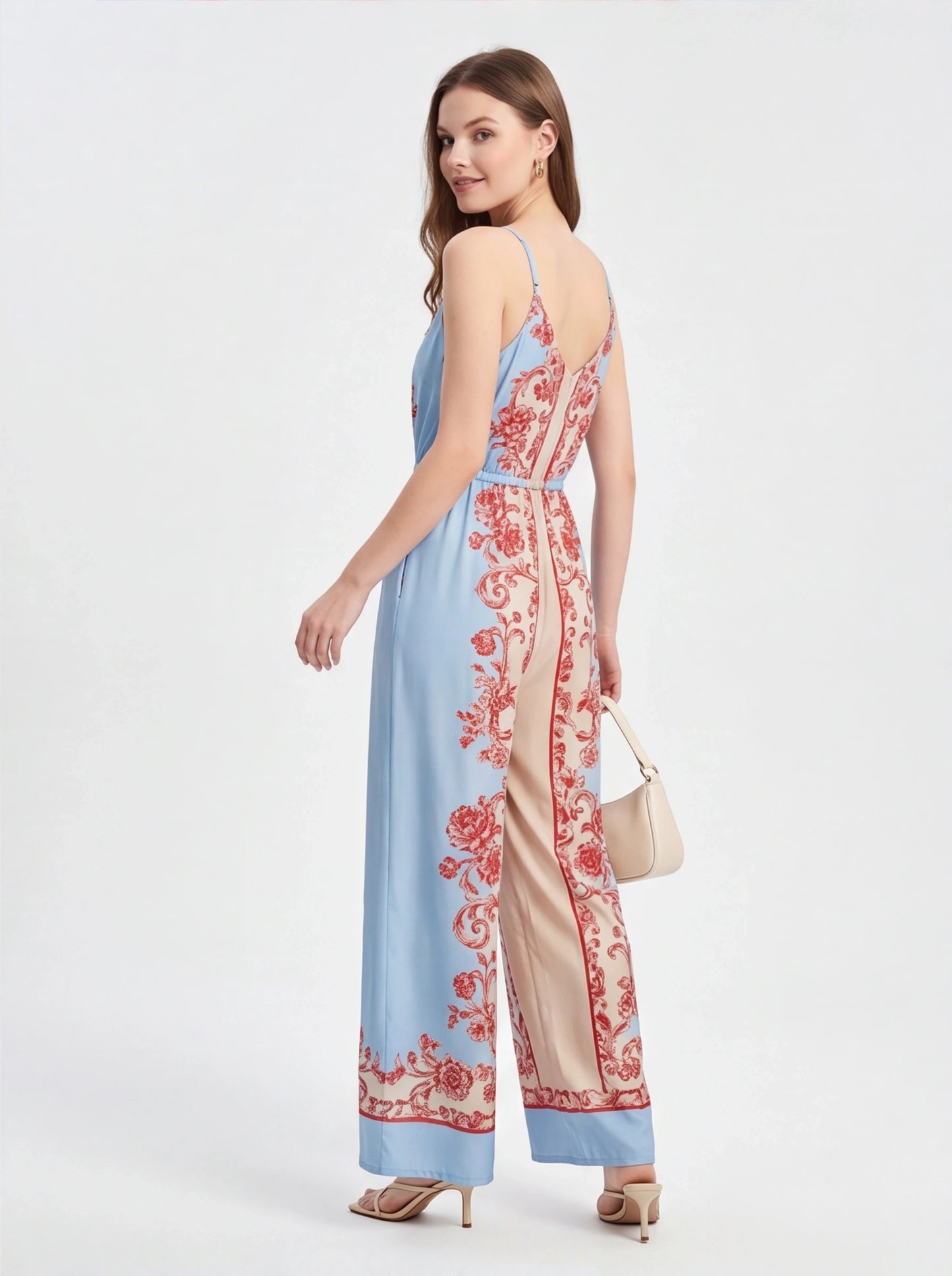 Jamota blue and peach floral print jumpsuit with adjustable straps and wide-leg design