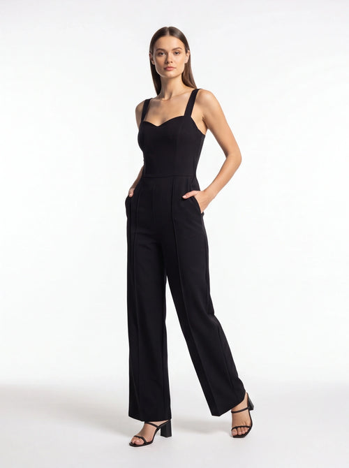 Jamota black women's jumpsuit with tailored fit, wide shoulder straps and side pockets