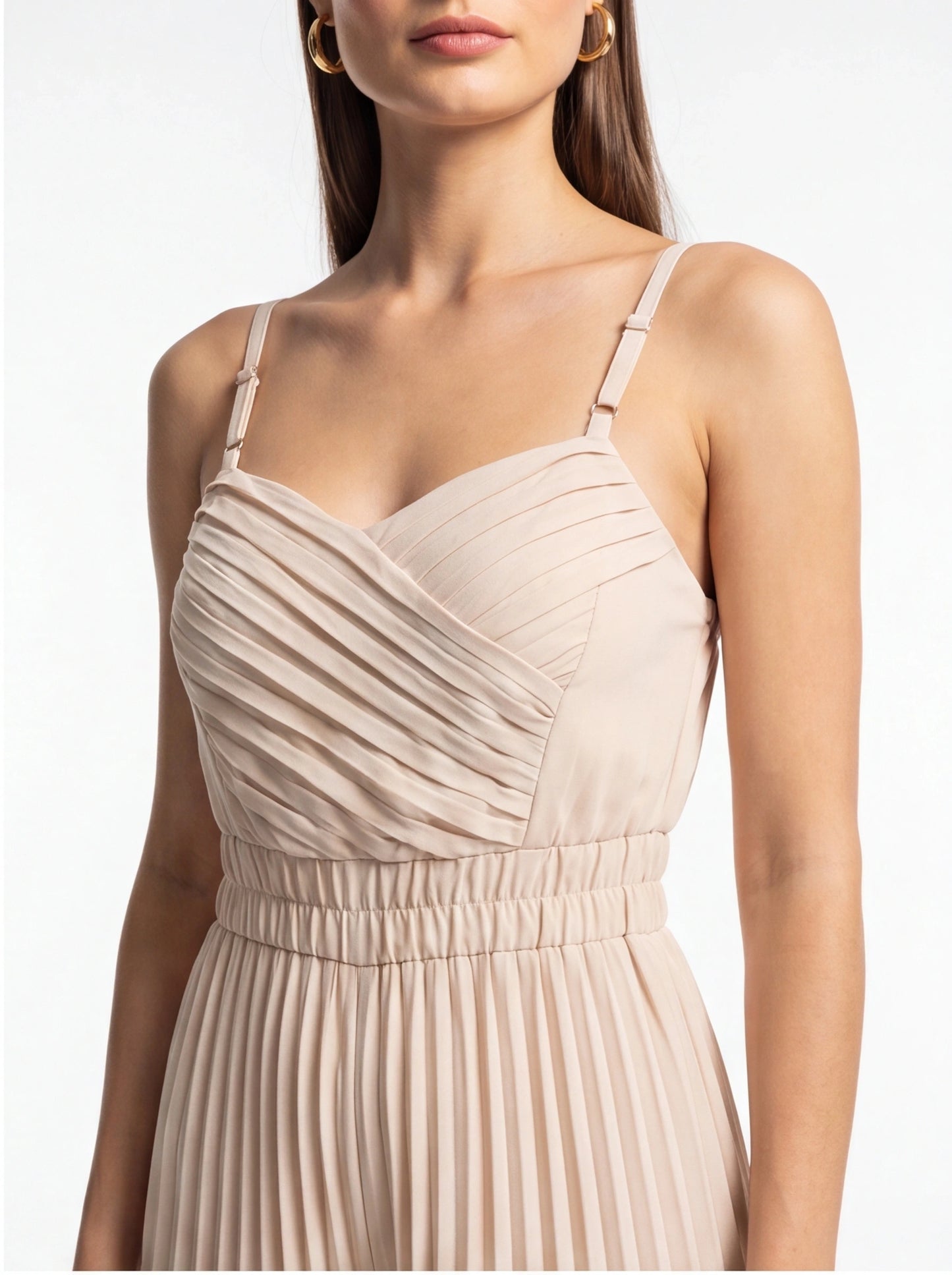 Jamota beige jumpsuit with adjustable straps and a pleated bodice