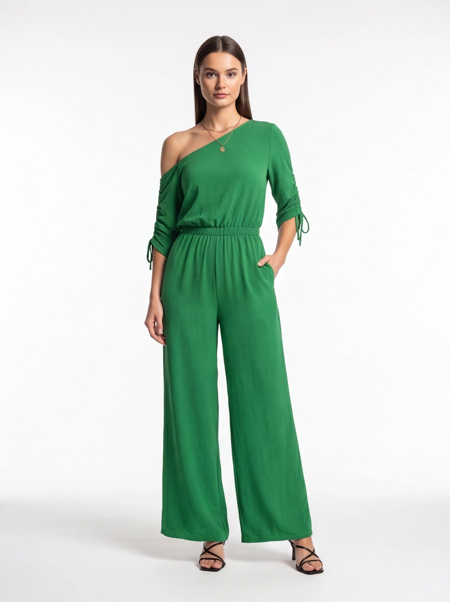 Jamota green one-shoulder jumpsuit with ruched sleeves and tied cuffs, elastic waistband, wide legs and pockets