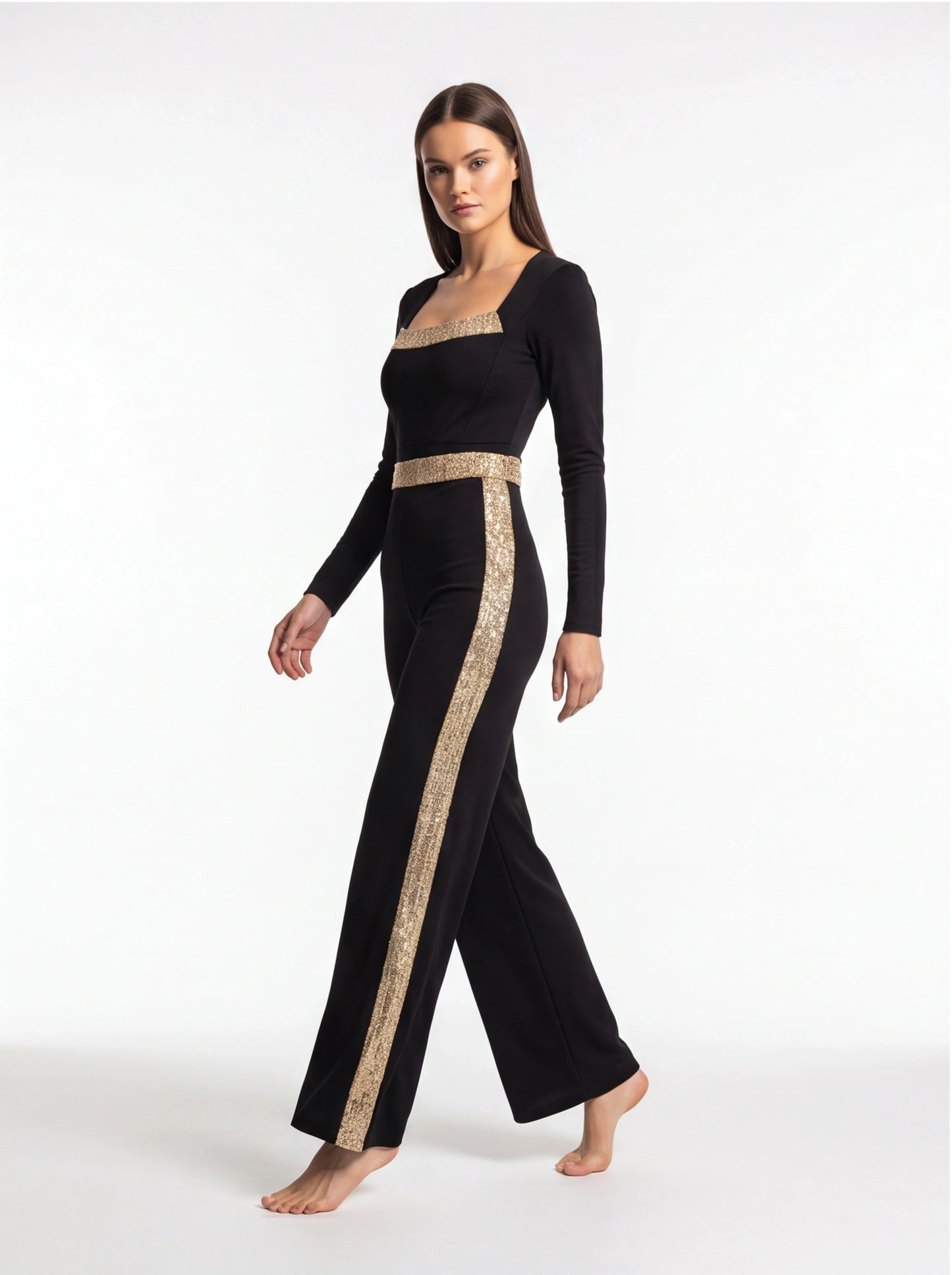 Jamota black jumpsuit with gold sequin stripes across the chest and down the sides, long sleeves, wide-leg pants.