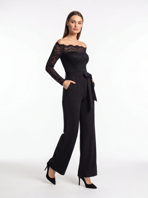 Jamota black jumpsuit with off-shoulder lace bodice, long lace sleeves, belted waist and pockets