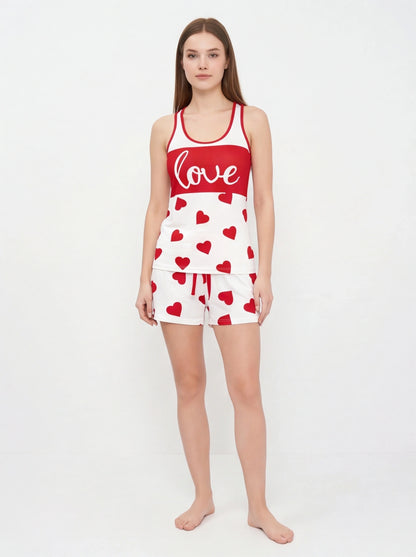 Cozy Heart Print Pajama Set by Jamota in red and white; soft fabric, sleeveless top and shorts with drawstring waist.