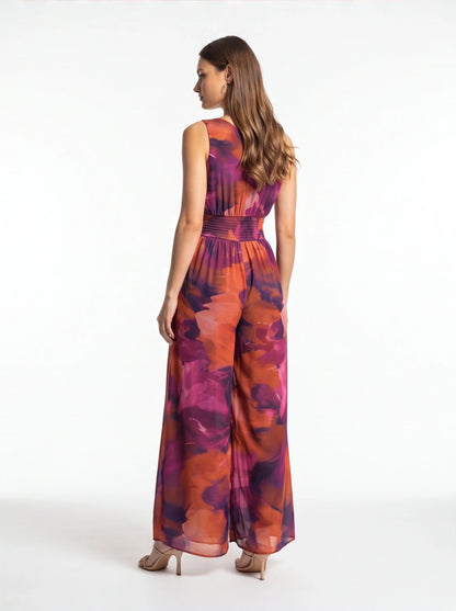 Jamota multicolor tie-dye women's jumpsuit with sleeveless top, elastic waist, and wide-leg pants.