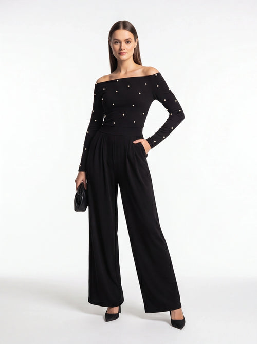 Jamota black women's jumpsuit with off-shoulder neckline and pearl embellishments, wide-leg pants