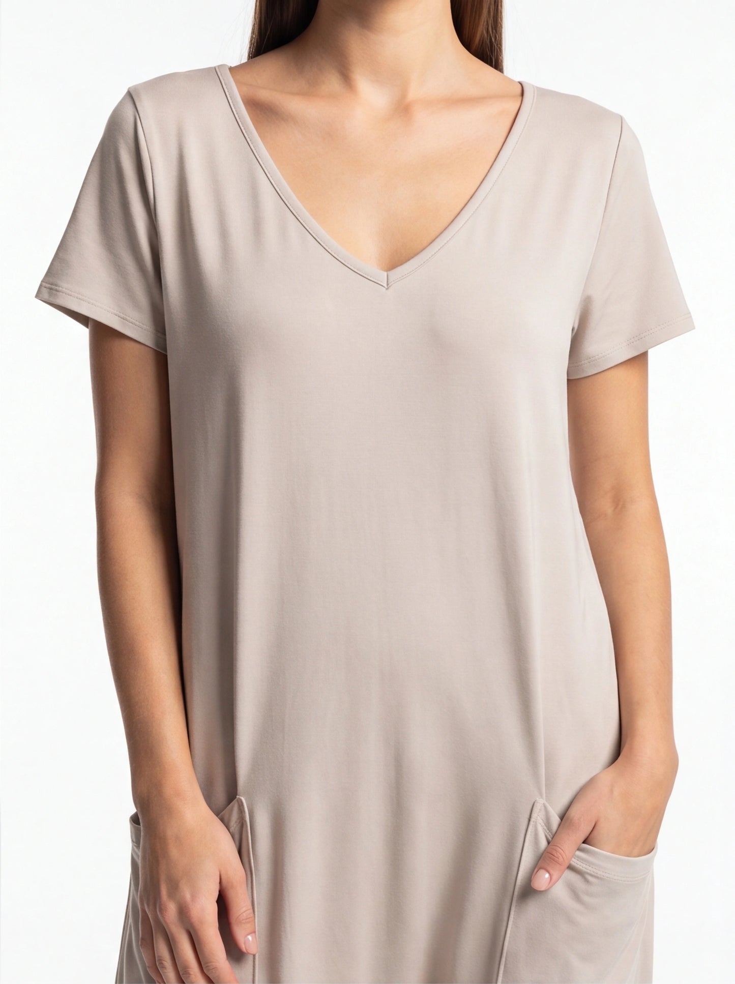 Jamota beige jumpsuit with V-neck, short sleeves and pockets; one-piece casual style, soft fabric for everyday wear.