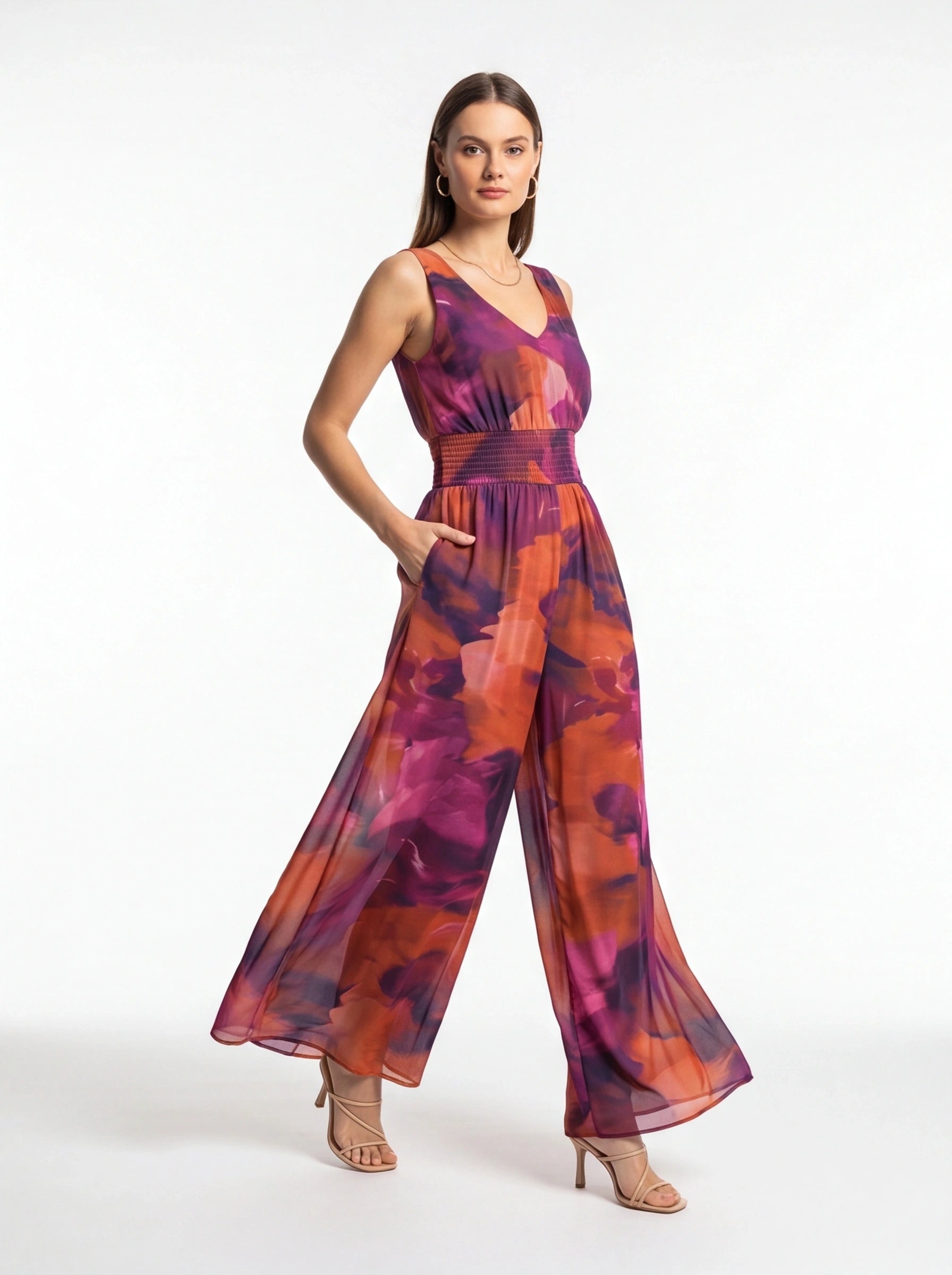 Jamota multicolor tie-dye women's jumpsuit with sleeveless V-neck and smocked waist, wide-leg pants
