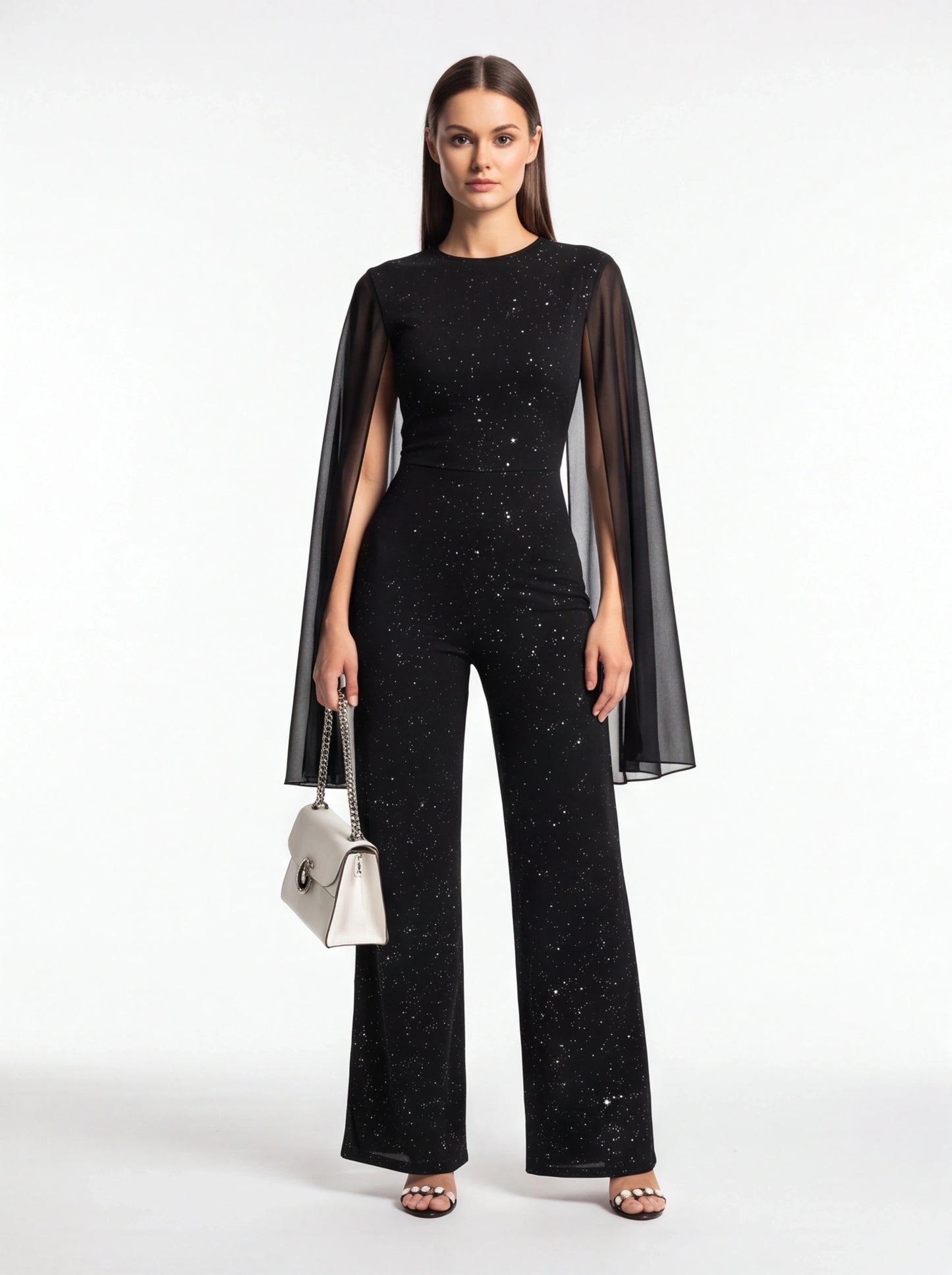 Jamota black jumpsuit with glitter speckle pattern and sheer cape sleeves, wide-leg pants