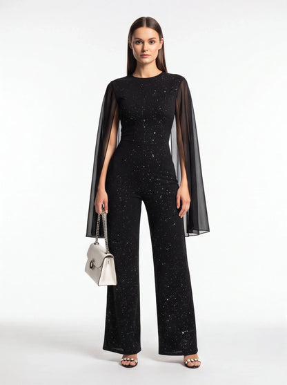 Jamota black jumpsuit with glitter speckle pattern and sheer cape sleeves, wide-leg pants