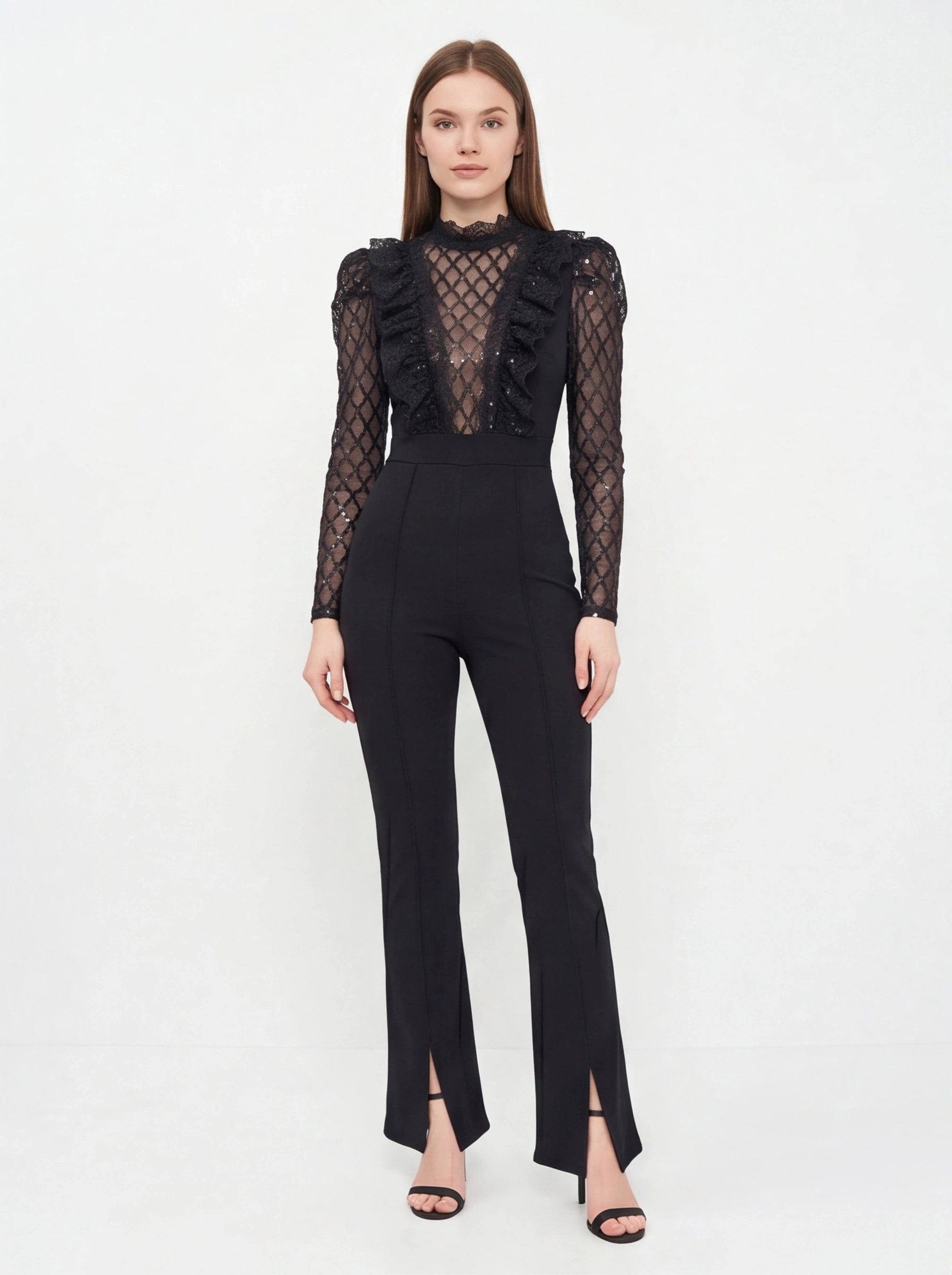 Jamota black see-through lace jumpsuit with ruffle front, lattice mesh sleeves, high neck.