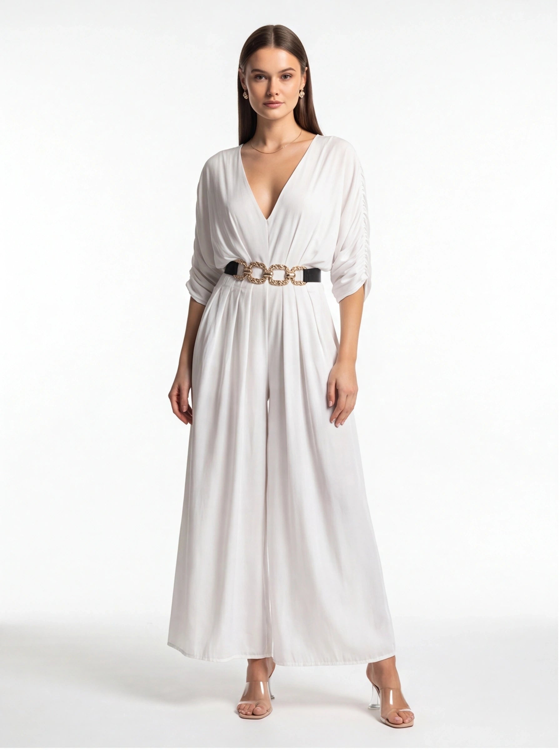 Jamota white jumpsuit with V-neck, draped sleeves, wide legs and gold chain belt