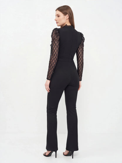 Jamota black jumpsuit with see-through lattice sleeves, lace-trim high neckline, fitted waist and flared legs.