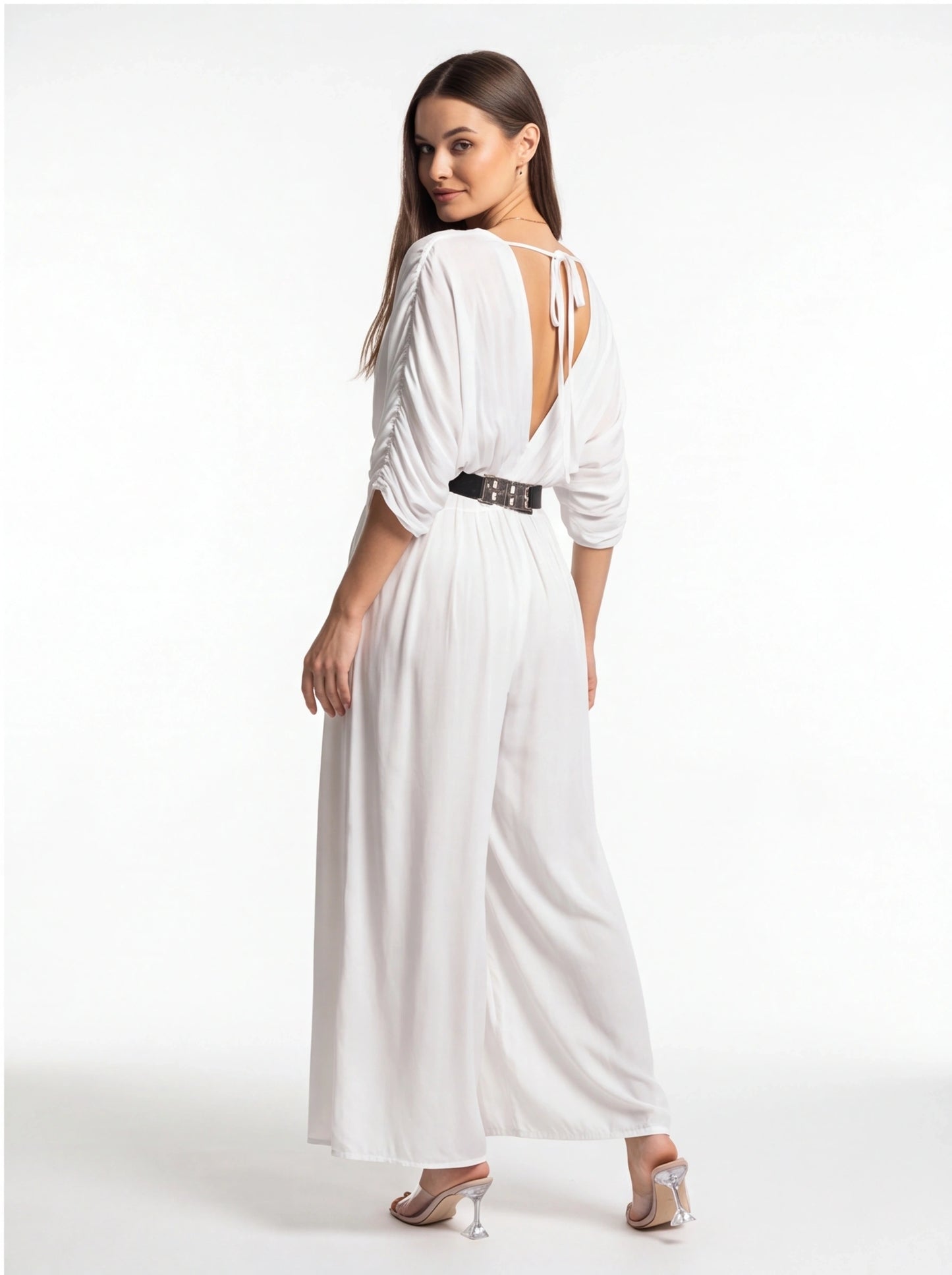 Jamota white jumpsuit backless design with adjustable straps, wide legs, belt