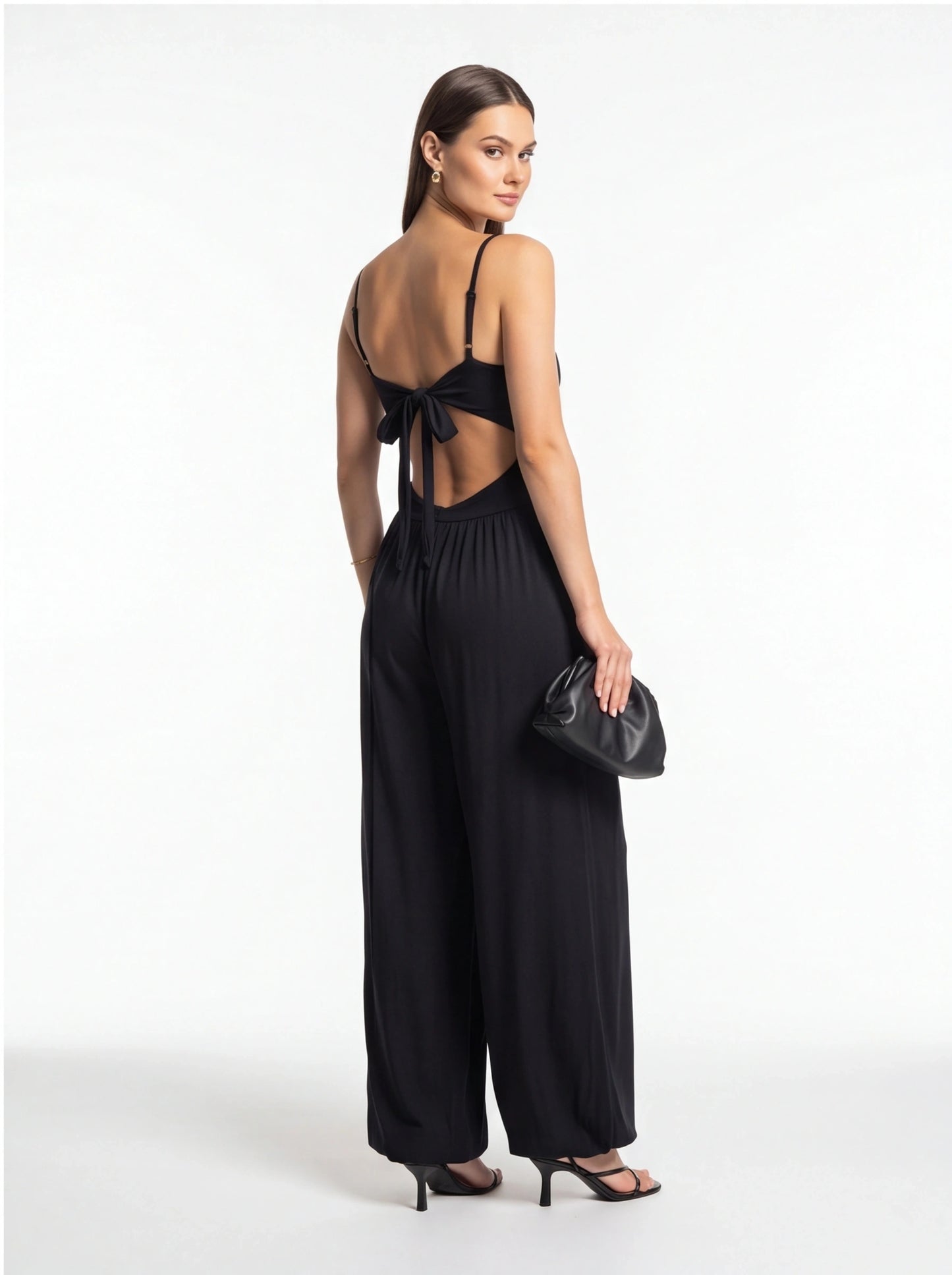 Jamota black backless summer jumpsuit with adjustable straps and wide-leg pants, bow at back